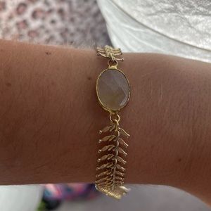 Gold leaf bracelet with stone